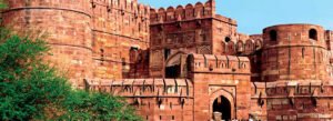 Agra Fort architecture featuring massive red sandstone walls and historic Mughal fortress entrance
