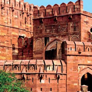 Agra Fort architecture featuring massive red sandstone walls and historic Mughal fortress entrance