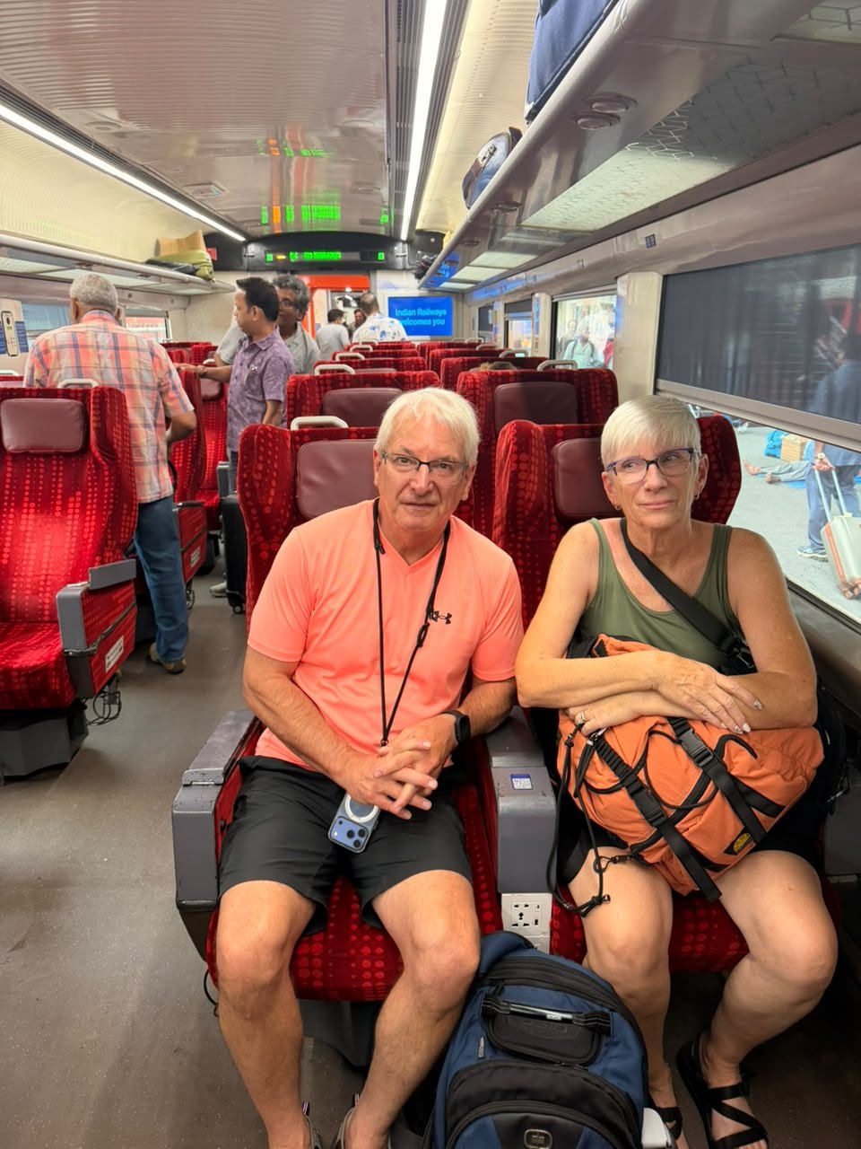 Travellers inside the Gatimaan Express during a Same Day Agra Taj Mahal Tour from Delhi