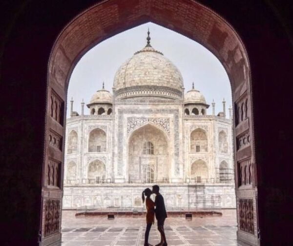 Taj Mahal view from an arch on a same day Agra tour from Jaipur
