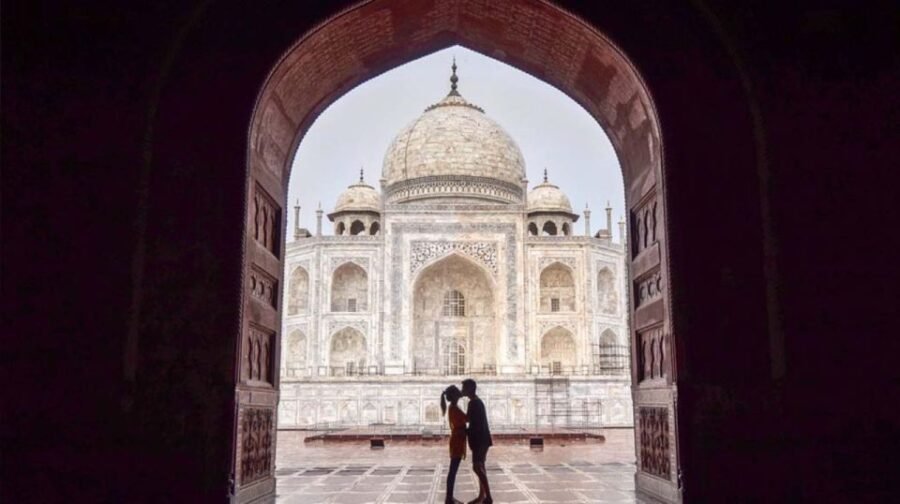 Taj Mahal view from an arch on a same day Agra tour from Jaipur