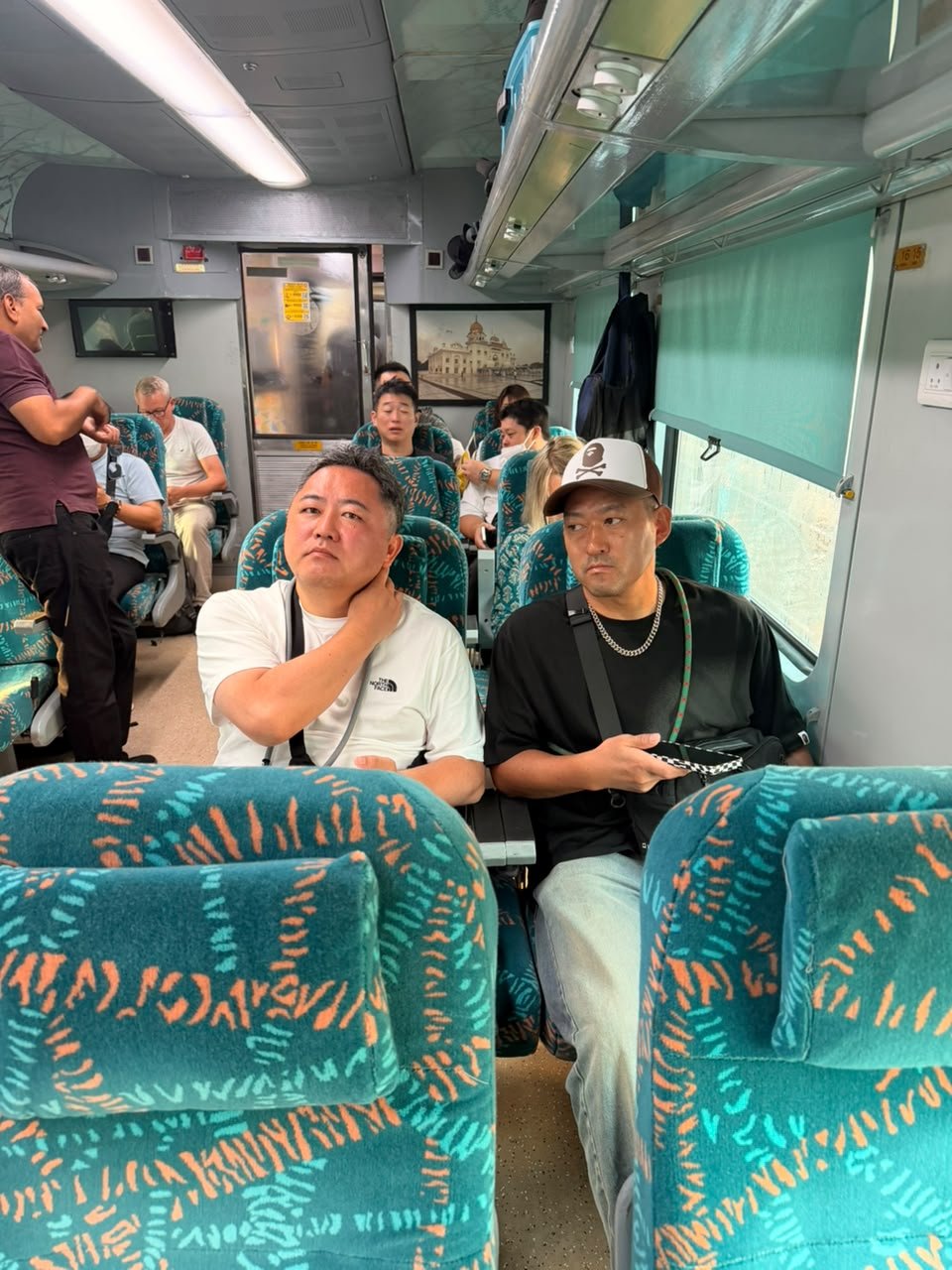 Travellers inside the Gatimaan Express during a Same Day Agra Taj Mahal Tour from Delhi