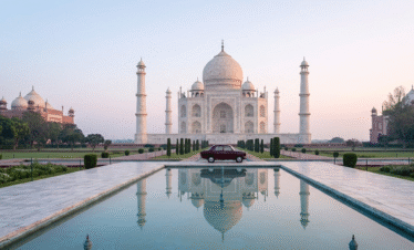 Professional sunrise view of the Taj Mahal for travelers using a Taj Mahal E Ticket on a curated luxury trip, including visits to the Lal Qila of Agra