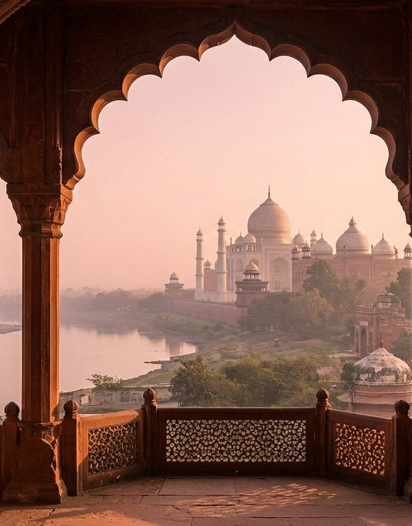A romantic view of the Taj Mahal framed from inside the Agra Fort, a key landmark on our tour