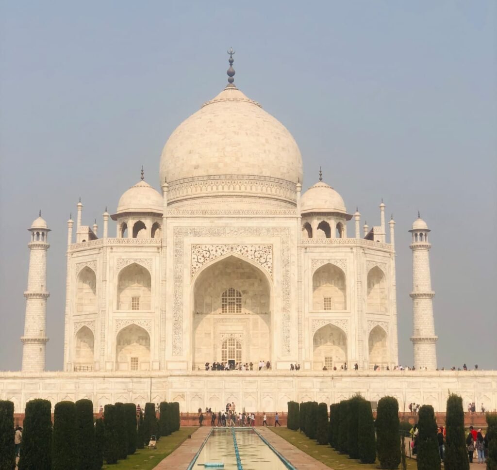 Travellers visiting the Taj Mahal during a Same Day Agra Taj Mahal Tour by Gatimaan Express Train