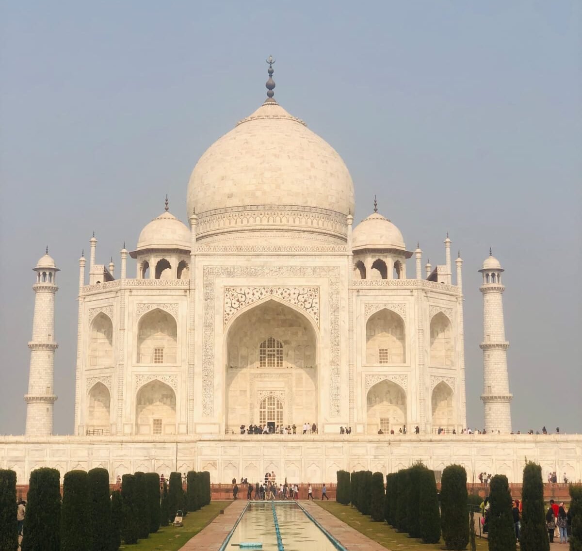 Travellers visiting the Taj Mahal during a Same Day Agra Taj Mahal Tour by Gatimaan Express Train