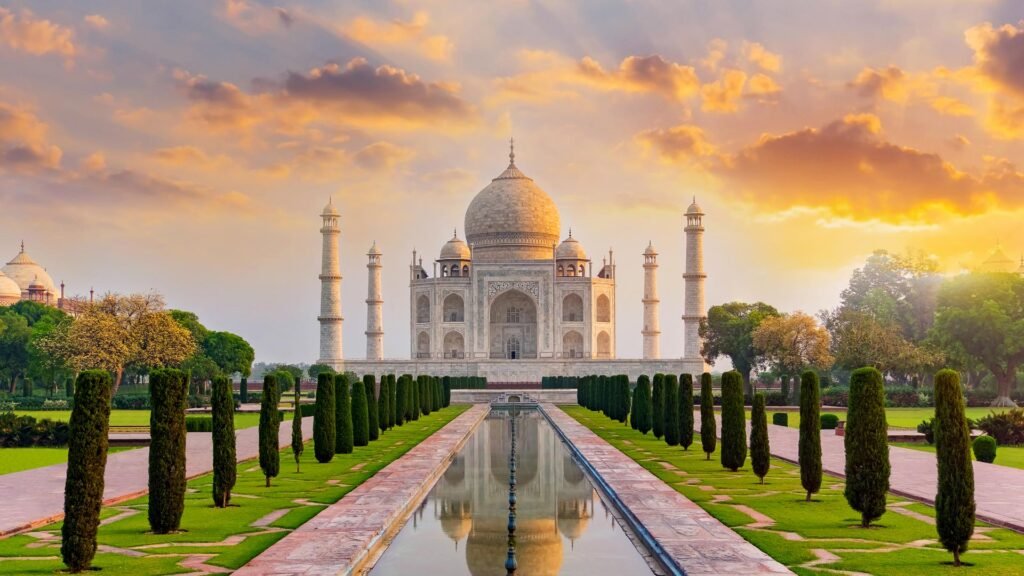 Taj Mahal at sunrise during Golden Triangle tour, symbol of love in Agra, India