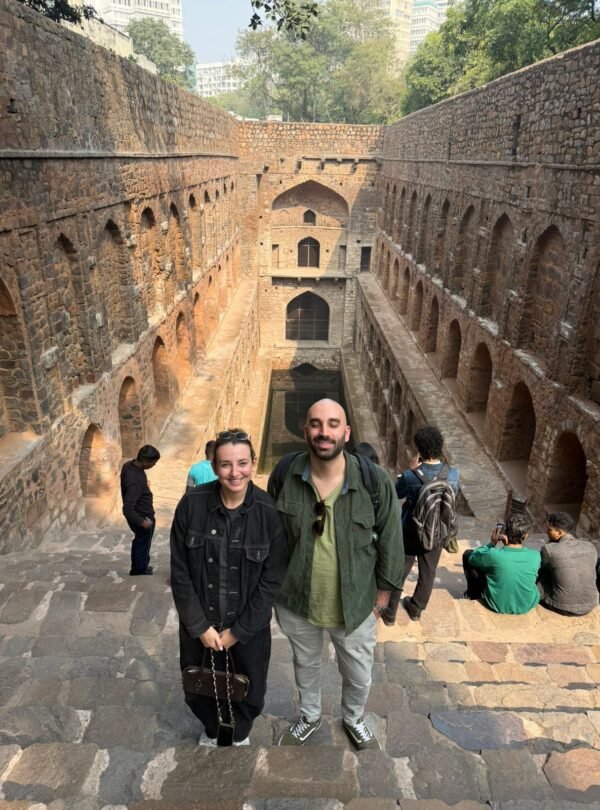 Tourists at Agrasen ki Baoli stepwell during a private half day delhi tour