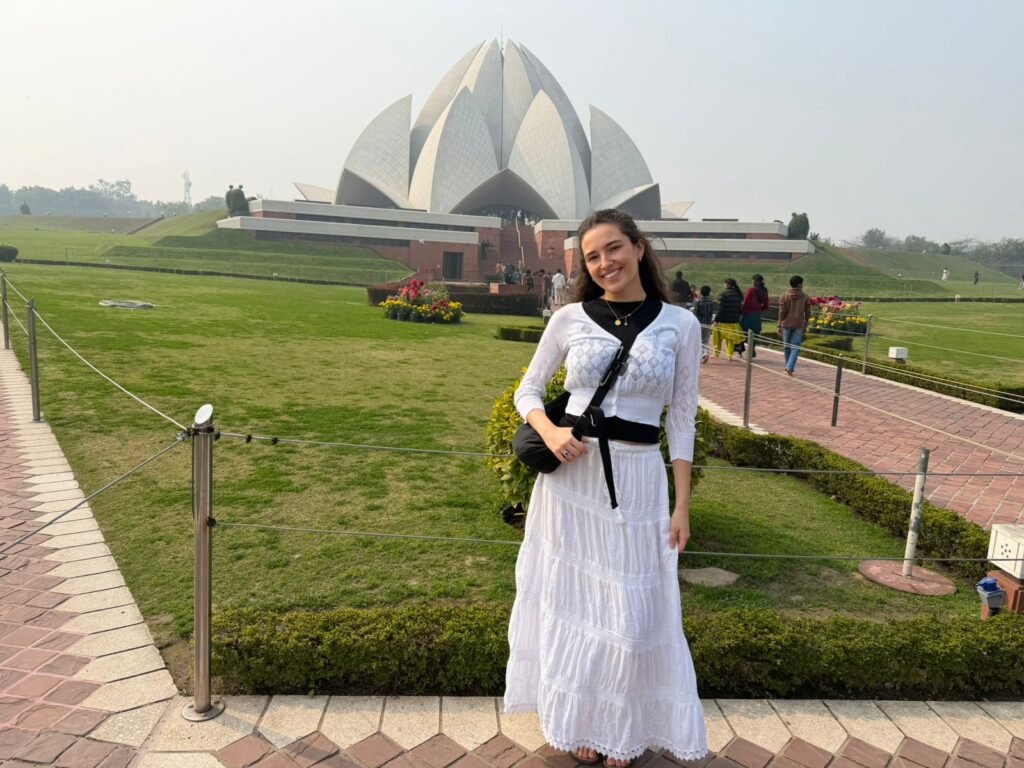 Lotus Temple Delhi with white petals glowing at sunset