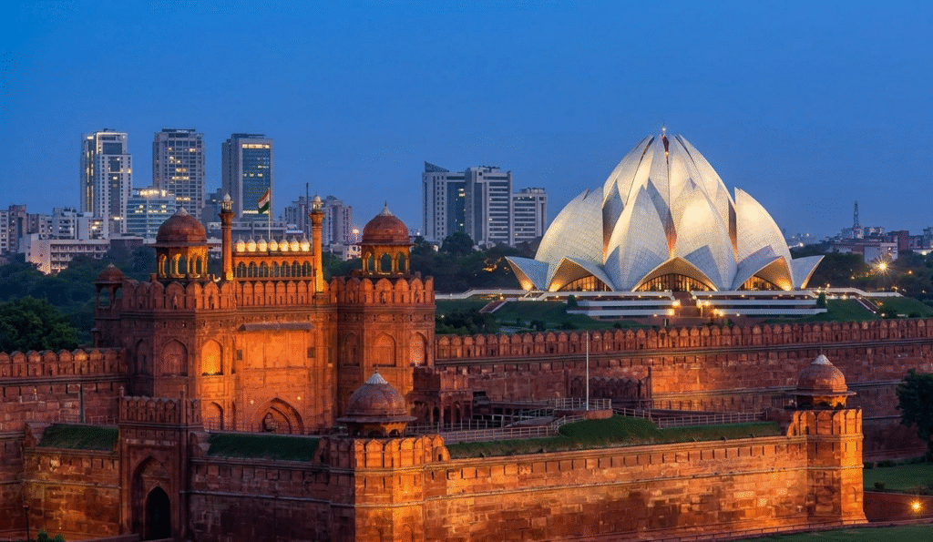 A sweeping view of New Delhi at dusk, showcasing the contrast between the historic Red Fort and the modern Lotus Temple on a Golden Triangle tour of India.