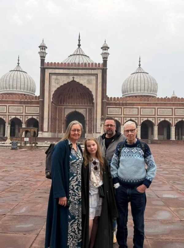 Tourists posing in front of Jama Masjid during a Same Day Delhi Tour By Car