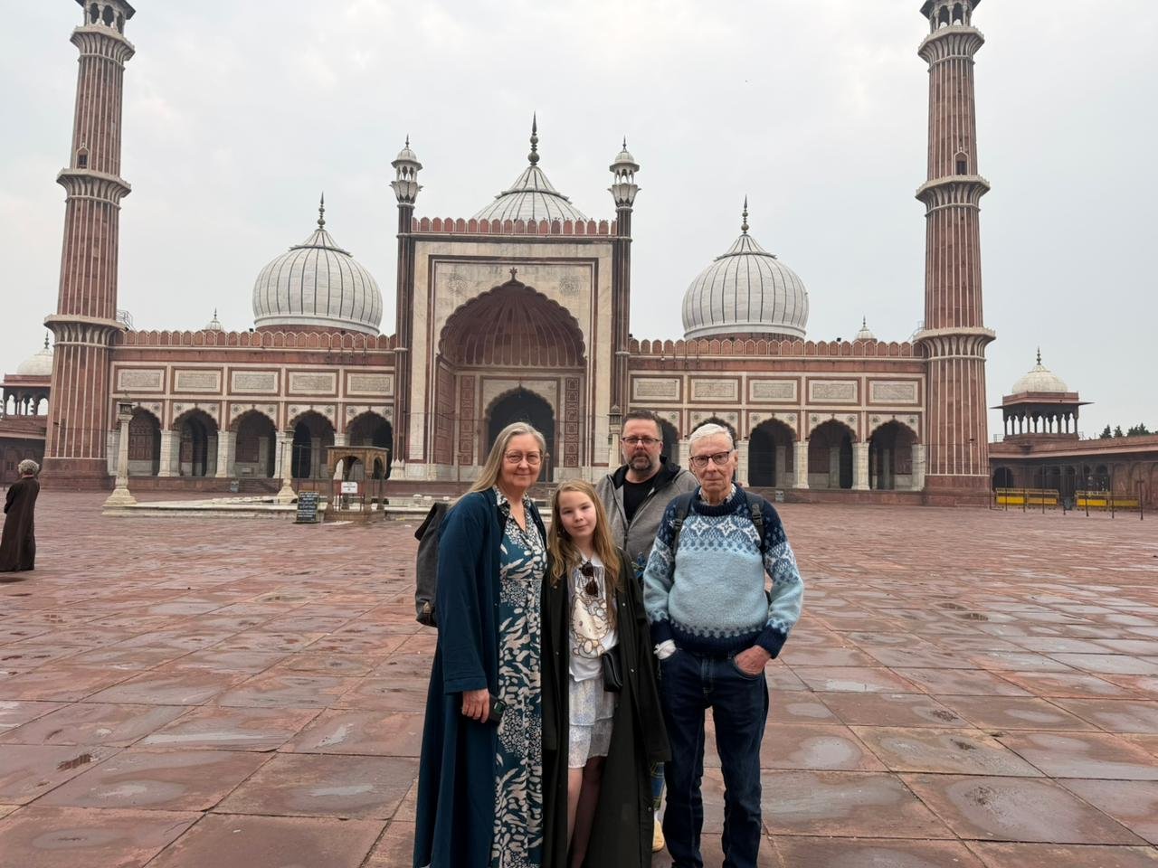 Tourists posing in front of Jama Masjid during a Same Day Delhi Tour By Car