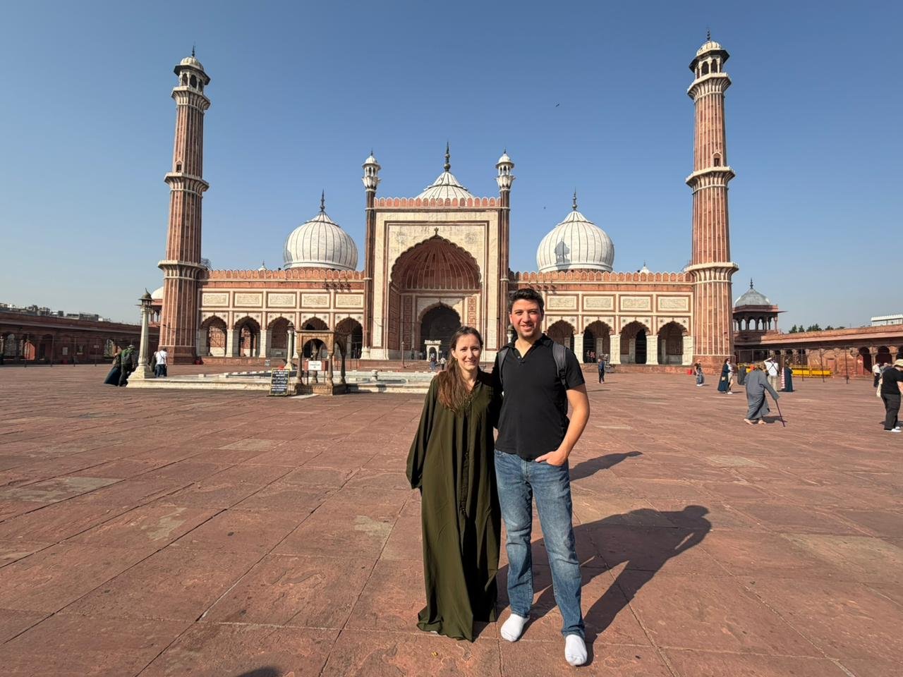 Travelers visiting Jama Masjid in Old Delhi on a Golden Triangle Tour with Varanasi