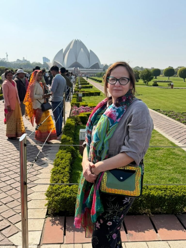 Trip Search Result 9 Tourist standing near the reflection pool of Taj Mahal during a Same Day Delhi Tour By Car
