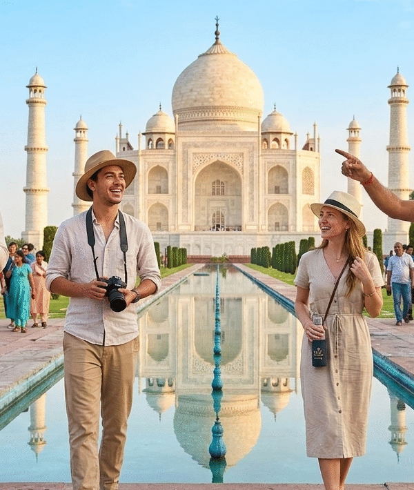 A group of smiling international tourists on a Taj Explorer Same Day Tour at the Taj Mahal, guided by a professional expert pointing out architectural details. The scene represents an efficient, high-quality Delhi to Agra day trip experience.