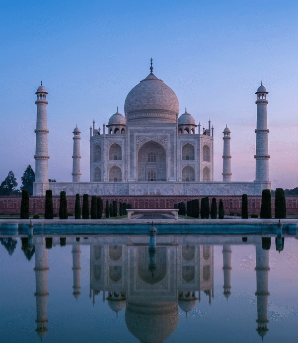 7 luxury golden triangle tours showcasing the stunning taj mahal blues during a private sunrise heritage journey.