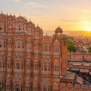 Pink city of Jaipur skyline with beautiful Hawa Mahal during sunset showcasing famous Jaipur attractions in Rajasthan