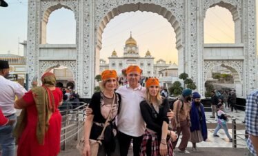 Delhi Temples and Spiritual Sites Tour visitors at Gurudwara Bangla Sahib experiencing Sikh heritage and spiritual culture in Delhi