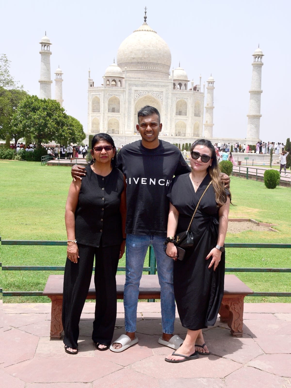 Travelers visiting the Taj Mahal in Agra during a Golden Triangle Tour with Varanasi