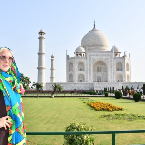 Tourist visiting the Taj Mahal in Agra during a luxury India tour