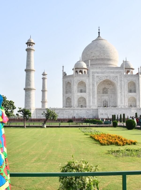 Tourist visiting the Taj Mahal in Agra during a luxury India tour