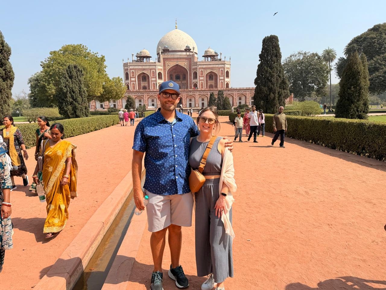 Delhi tour with visitors at Humayun's Tomb during a private half day Delhi sightseeing tour