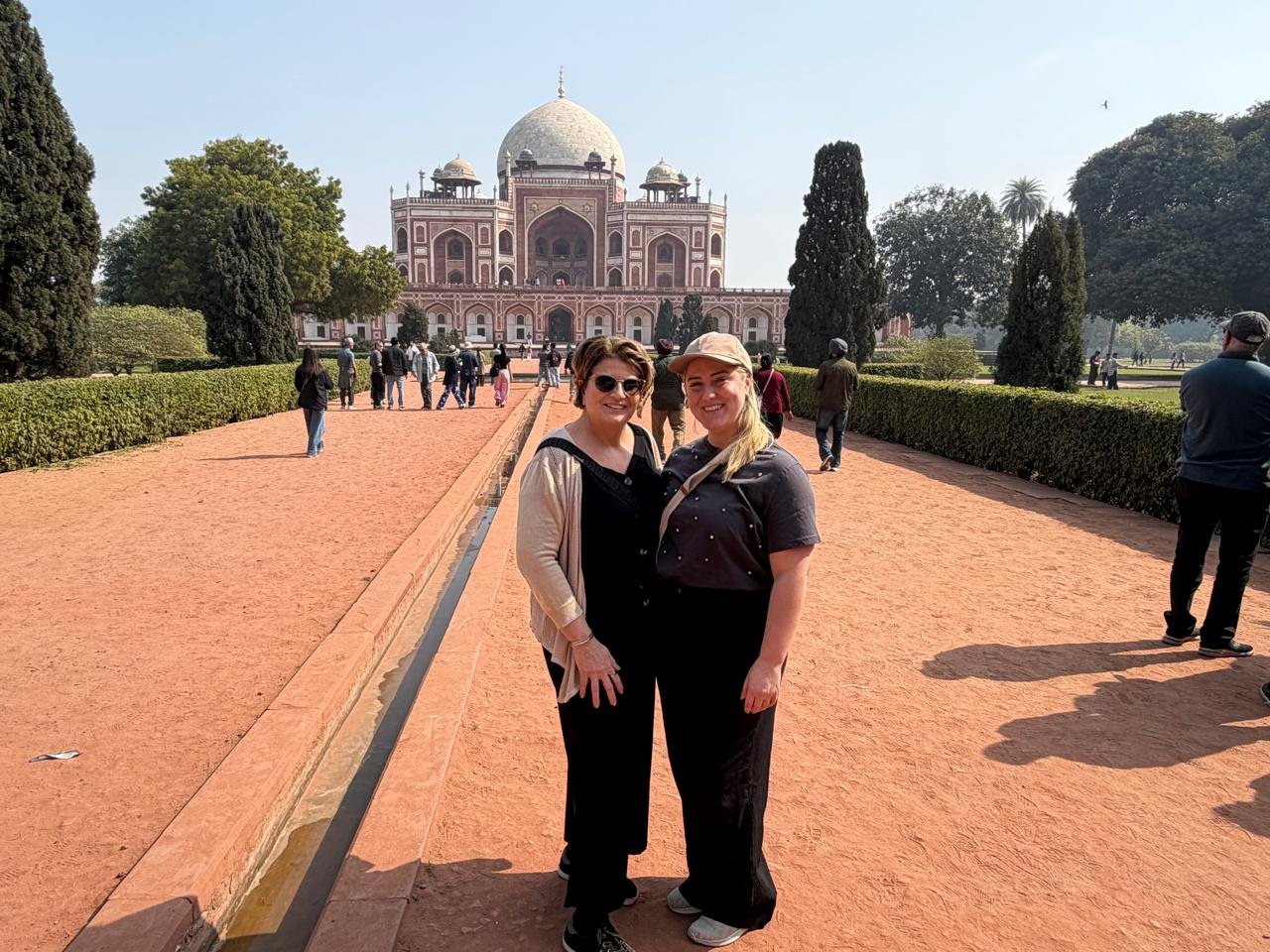 Travellers visiting Humayun's Tomb during a same day Delhi tour by car