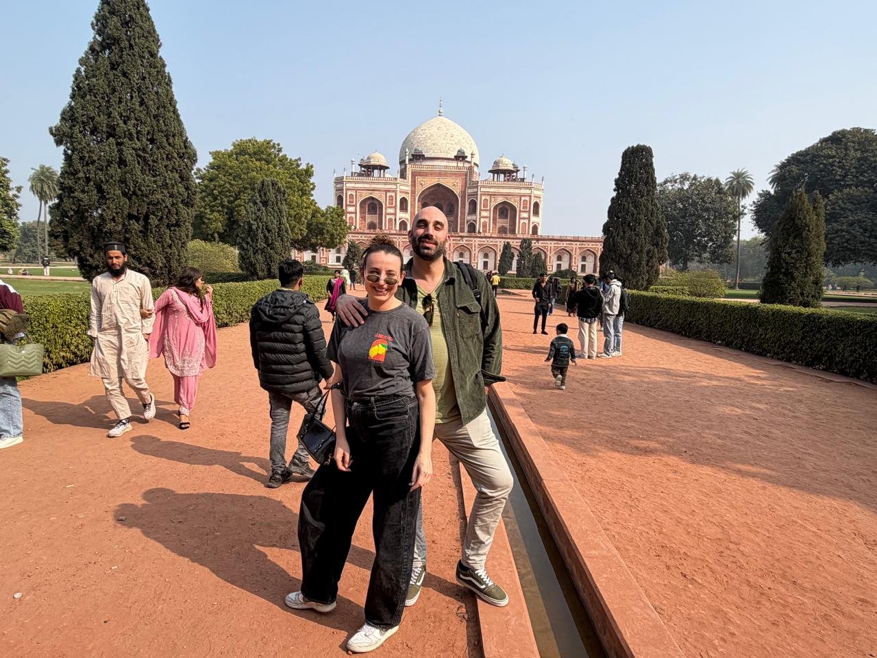 Delhi tour with visitors at Humayun's Tomb during a private half day Delhi sightseeing tour