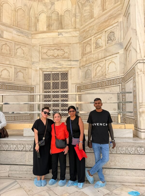 Travellers visiting the Taj Mahal during an Agra sightseeing tour from Delhi