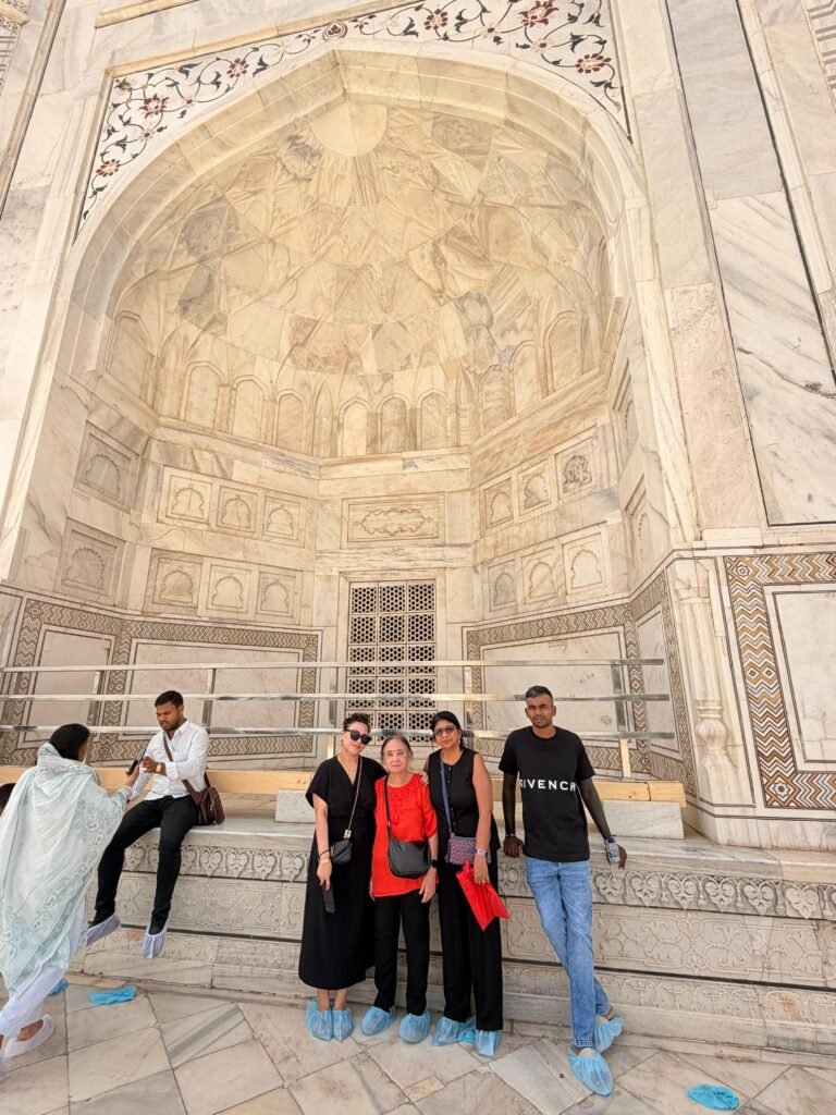Trip Search Result 63 Travelers exploring the intricate marble interior of the Taj Mahal during a Golden Triangle Tour with Varanasi