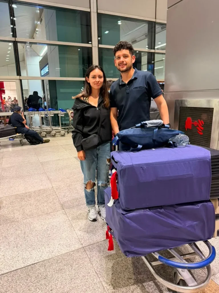 Delhi Airport Transfer to Hotel with travellers and luggage at Delhi Airport