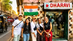 From Chandni Chowk to Dharavi, travelers exploring Dharavi in Mumbai with a local guide during a cultural walking tour.
