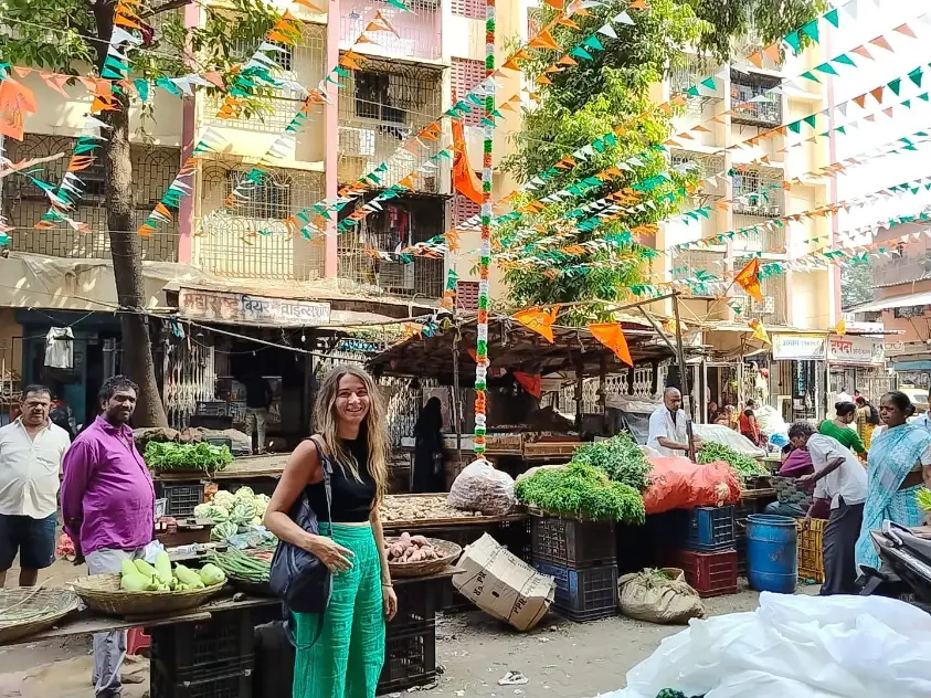From Chandni Chowk to Dharavi, a traveler exploring a local market in Dharavi during a guided walking tour in Mumbai.