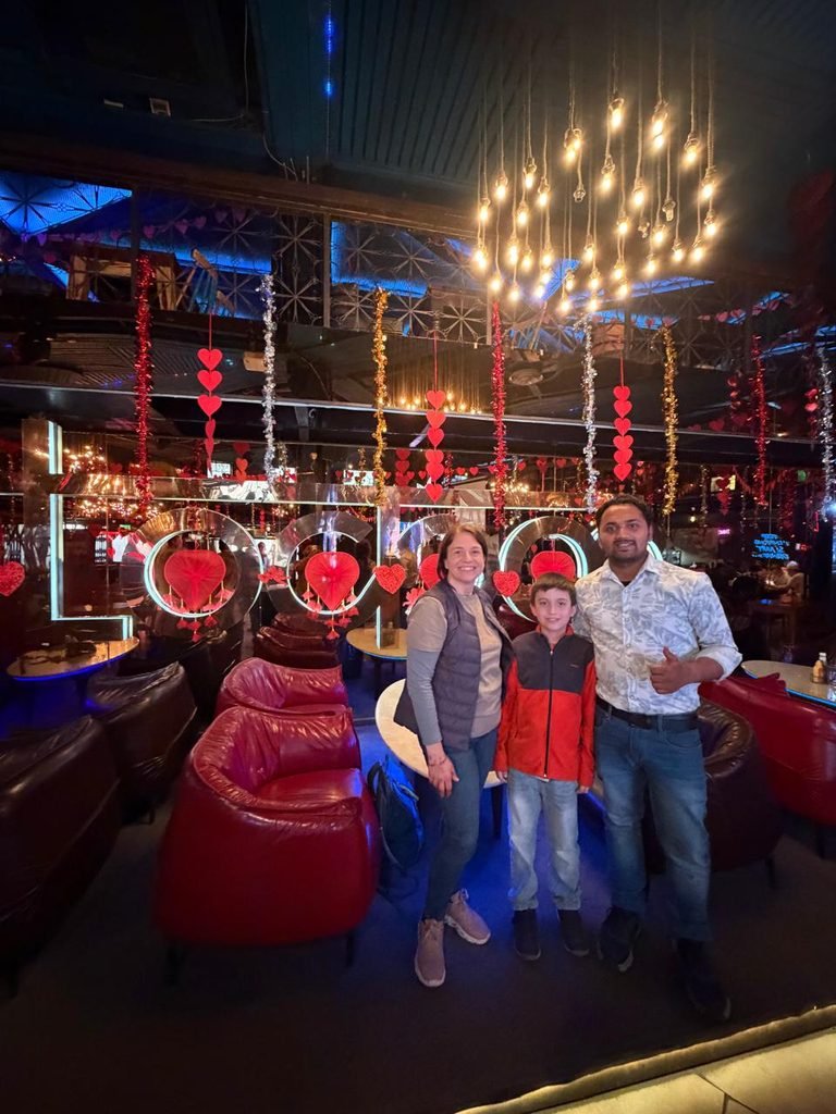 Places to Visit in Delhi at Night: 15 Best Spots & Tips 6 Family enjoying Khan Market Delhi at night while exploring places to visit in Delhi at night