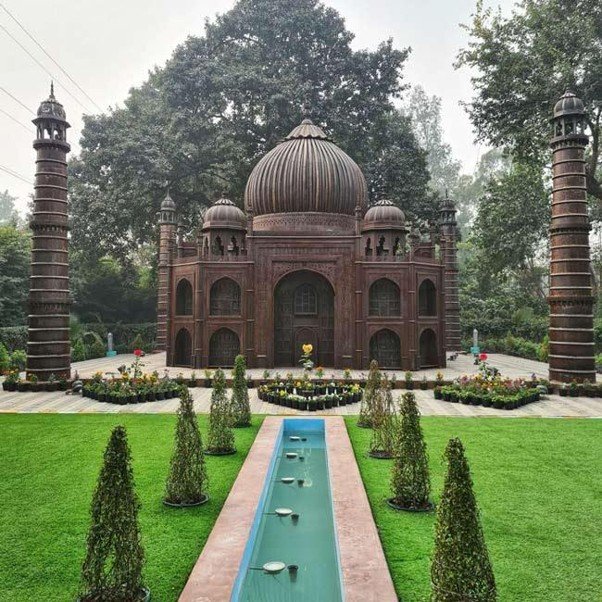 15 Best Parks in Delhi for Nature, Morning Walks and Sightseeing 10 Parks in Delhi featuring a domed monument, landscaped lawns and a water channel at Bharat Darshan Park