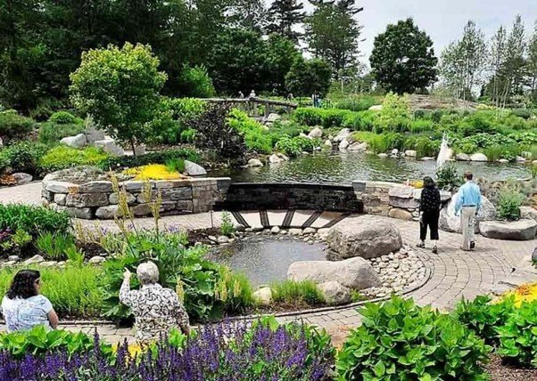15 Best Parks in Delhi for Nature, Morning Walks and Sightseeing 7 Parks in Delhi featuring landscaped gardens, a stone bridge, a pond and colourful flower beds at the Garden of Five Senses