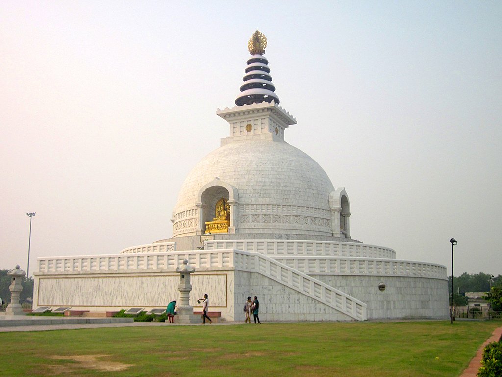 15 Best Parks in Delhi for Nature, Morning Walks and Sightseeing 15 Parks in Delhi featuring a white Buddhist stupa and landscaped lawns at Millennium Indraprastha Park